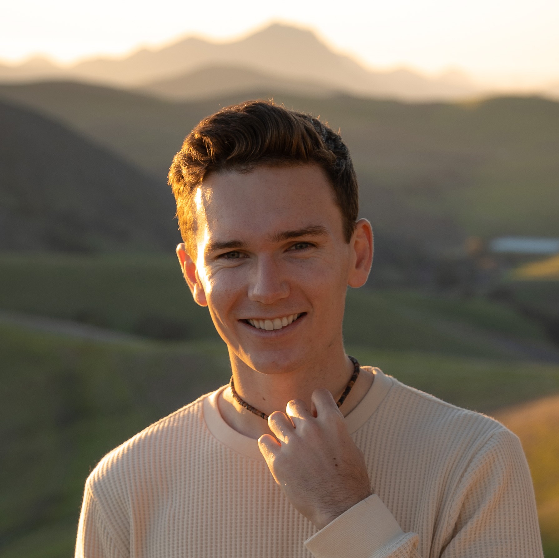 Luke Stimson, founder of Fogline Post, at golden hour in the California hills